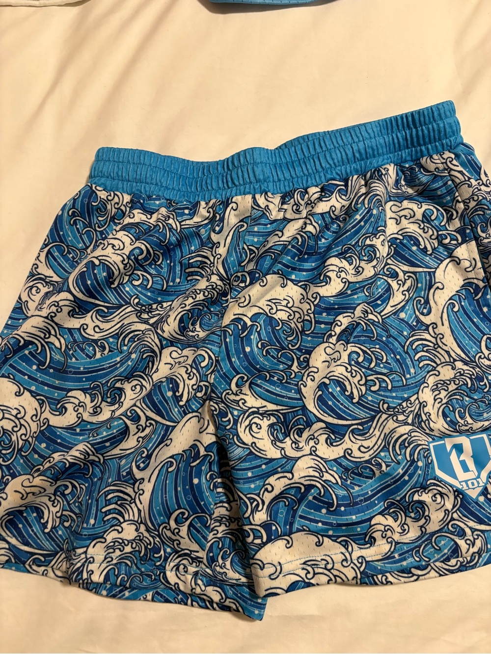 Boys Blue Wave Print Swim Trunks with Elastic Waist